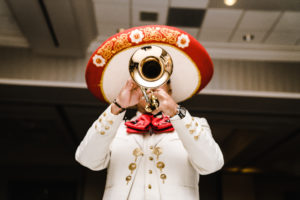 mariachi band member playing trumpet
